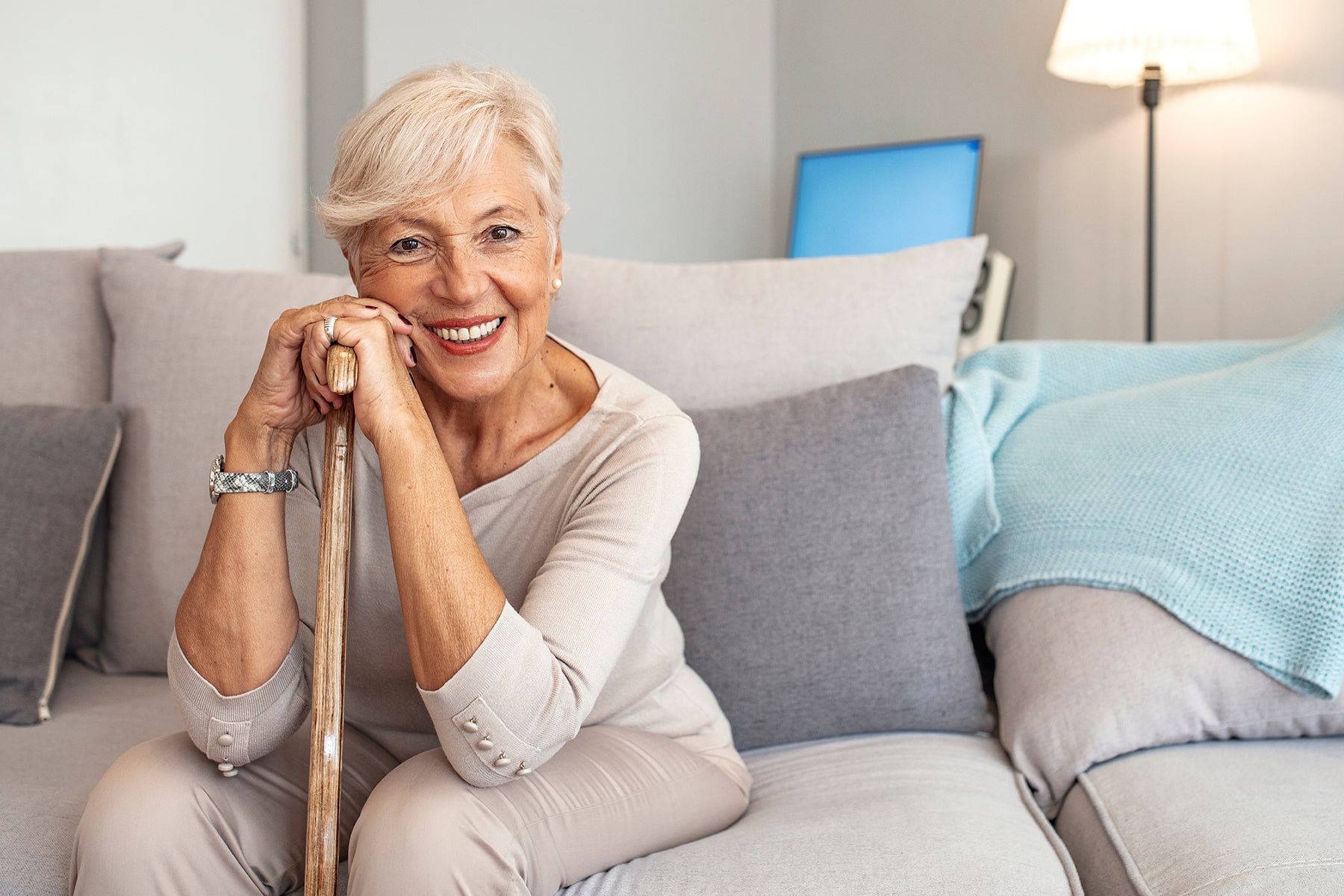 Woman smiling after visiting the dentures dentist in Apex, NC