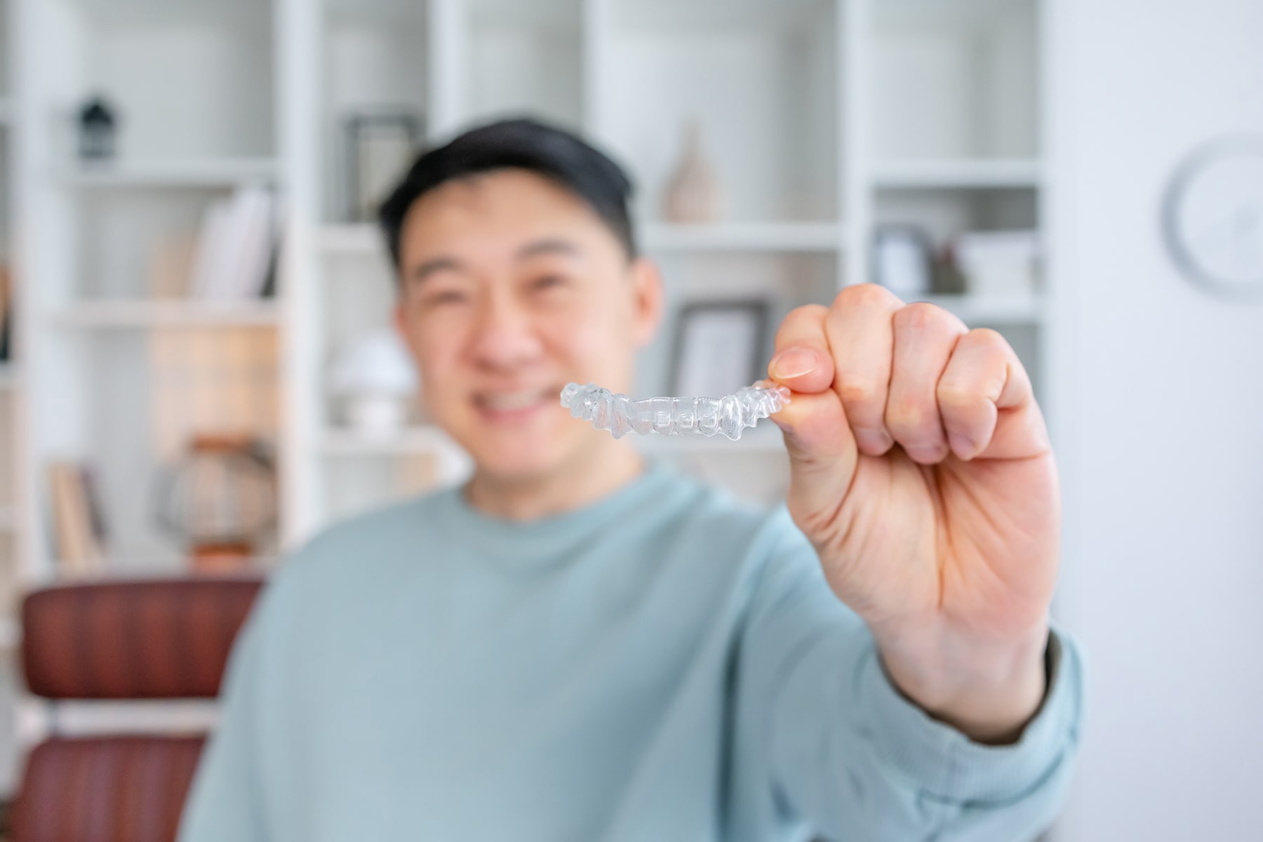 Man smiling after getting orthodontic care in Apex, NC