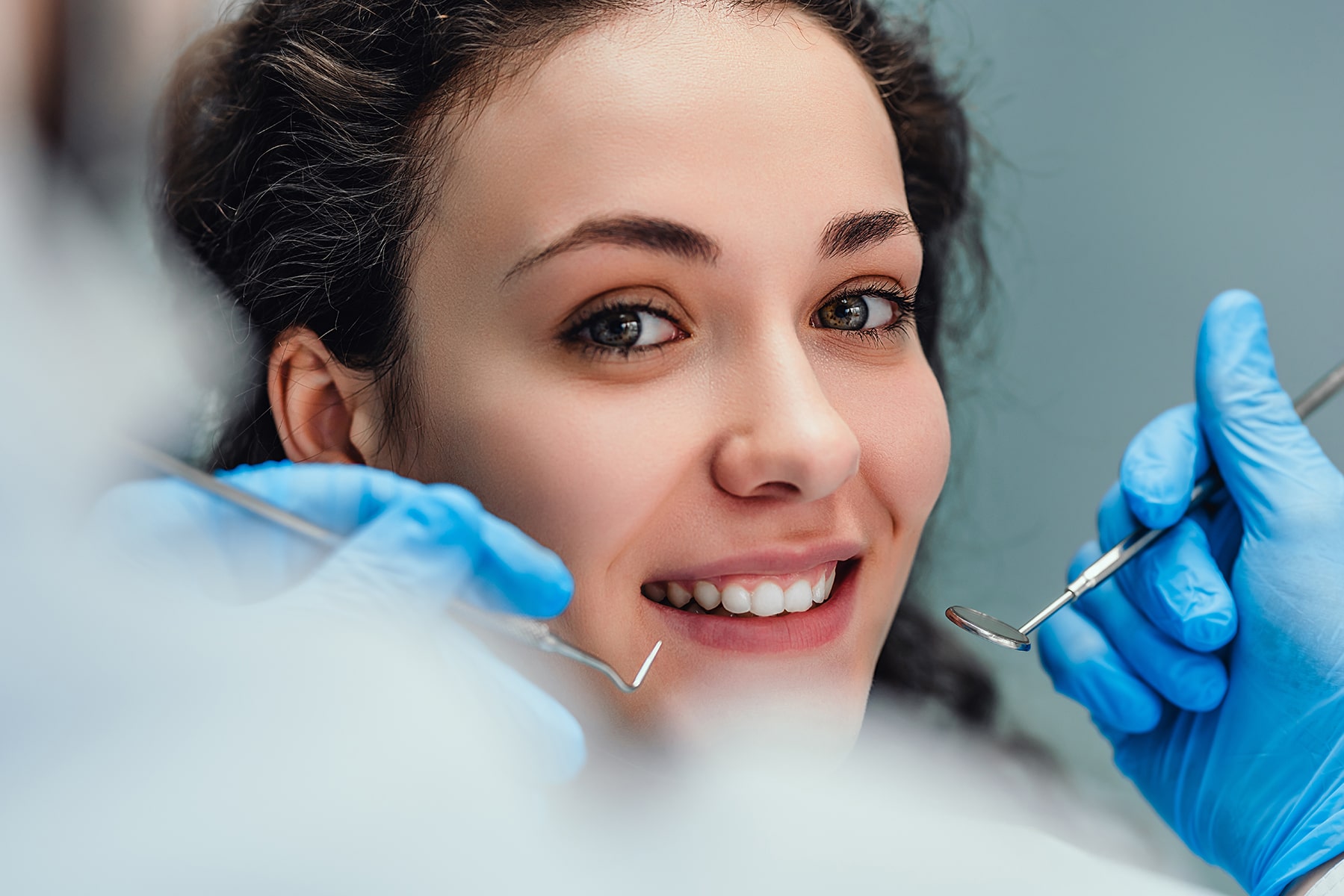 Woman at the teeth cleaning dentist in Apex, NC